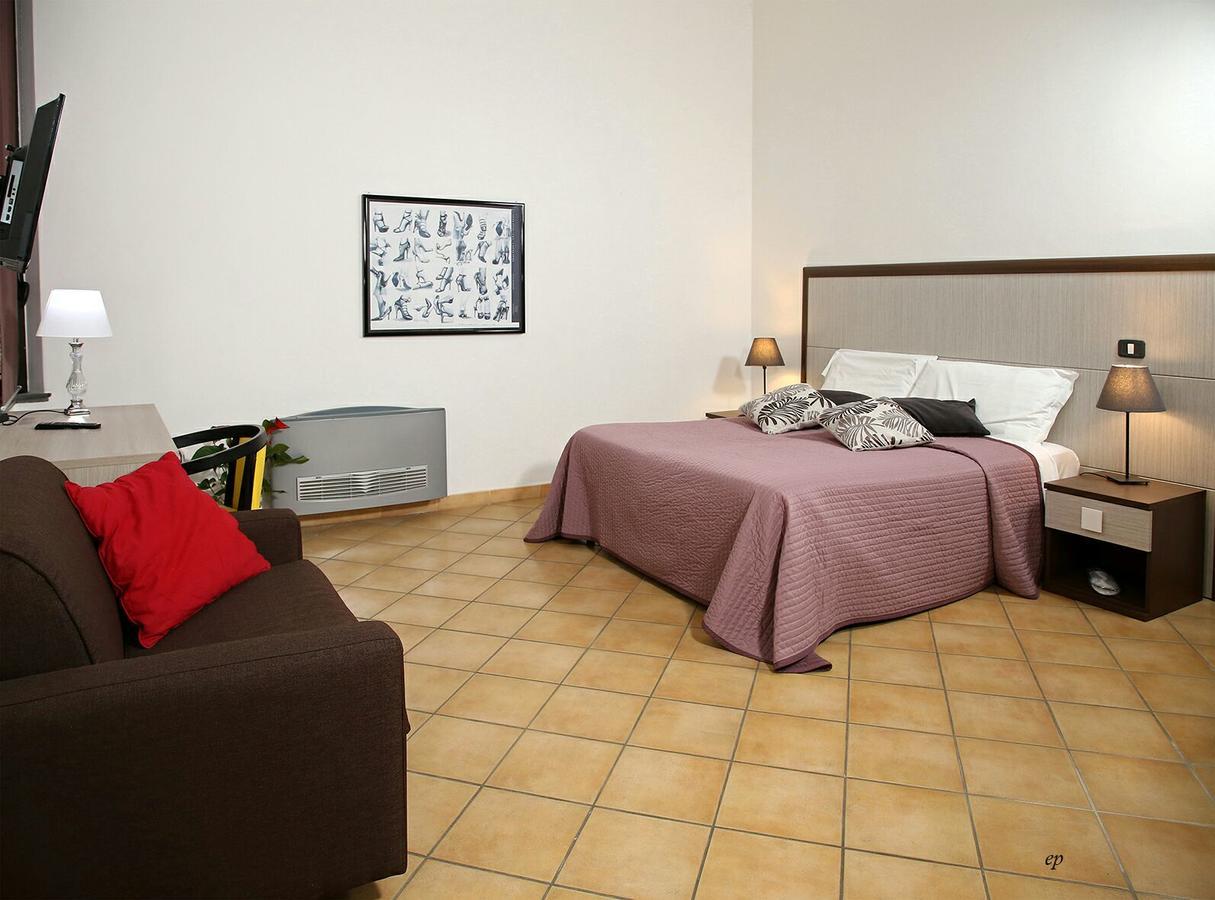 Caravaggio Hotel Napoli Bagian luar foto